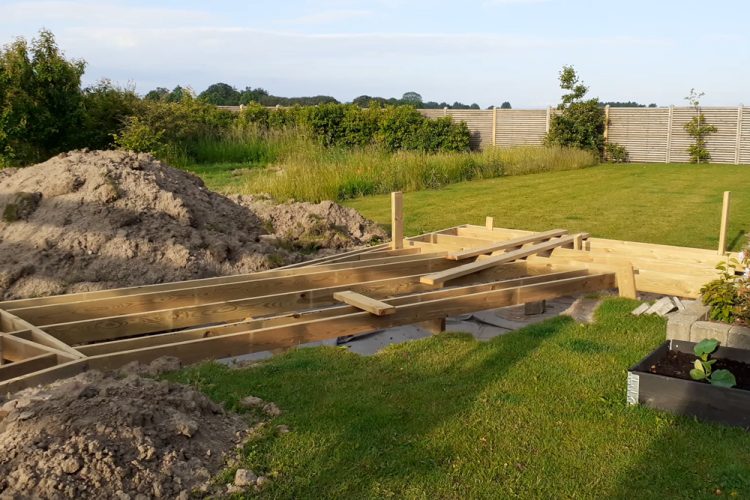 Wooden foundation frame for a huge deck.