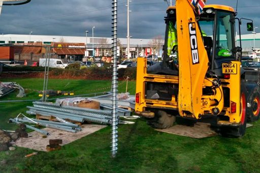 Installation of a large GroundPlug® TwisterTM Screw Pile. GroundPlug screw pile foundation being installed by a JCB 3CX machine.